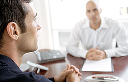Two men sitting in an office